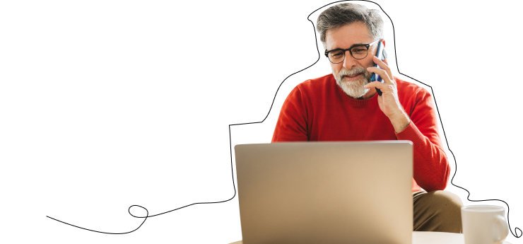man on phone and computer